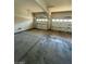 Inside the garage with insulated doors and bare concrete floor at 9622 Staff Ln, Las Vegas, NV 89178