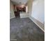 Open concept living space featuring tile flooring at 9622 Staff Ln, Las Vegas, NV 89178