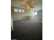 Open-plan living room offering recessed lighting, carpet flooring and neutral paint at 9622 Staff Ln, Las Vegas, NV 89178