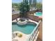 Beautiful backyard pool with a spa and lush landscaping, perfect for relaxing and entertaining at 9622 Staff Ln, Las Vegas, NV 89178