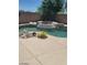 Backyard oasis featuring a beautiful in-ground pool and spa, perfect for relaxation at 9622 Staff Ln, Las Vegas, NV 89178