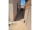 View of the side yard with gravel and a walkway at 9622 Staff Ln, Las Vegas, NV 89178