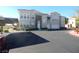Modern condo with two-car garage, carport, and manicured landscaping in a desirable community at 9975 Peace Way # 1149, Las Vegas, NV 89147