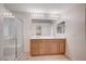 Bright bathroom with a double sink vanity and glass enclosed shower at , Henderson, NV 89011