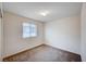 Bedroom featuring neutral carpet and a window with natural light at , Henderson, NV 89011