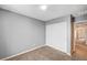 Neutral bedroom with carpet and large sliding-door closet; ample space for furnishings at , Henderson, NV 89011