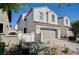 Charming two-story home with a two-car garage and a well-maintained, xeriscaped front yard at , Henderson, NV 89011