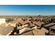 Residential community homes with solar panels and rooftops with mountain views at 10733 Red Badge Ave, Las Vegas, NV 89166
