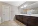 Spacious bathroom features a large vanity with double sinks and a large mirror at 10733 Red Badge Ave, Las Vegas, NV 89166