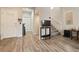 Inviting entryway with hardwood floors, staircase, and convenient coat rack, leading to the living areas at 10733 Red Badge Ave, Las Vegas, NV 89166