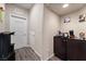 Functional mud room area with storage cabinets, convenient access to utilities, and easy entryway to the home at 10733 Red Badge Ave, Las Vegas, NV 89166