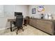 Stylish home office featuring a modern desk setup, comfortable chair, and ample storage space at 10733 Red Badge Ave, Las Vegas, NV 89166