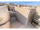 Rooftop deck includes stairs and seating, with beautiful views of the surrounding neighborhood at 10733 Red Badge Ave, Las Vegas, NV 89166