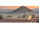 Terrace offers stunning views of the mountainous horizon and rooftops, creating a picturesque scene at 10733 Red Badge Ave, Las Vegas, NV 89166
