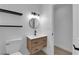 Bathroom with updated vanity, stylish fixtures, and modern toilet at 1108 Putnam Ave, North Las Vegas, NV 89030