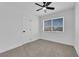 Bedroom with neutral carpet, and a large window at 1108 Putnam Ave, North Las Vegas, NV 89030