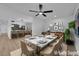 Elegant dining room featuring a marble table and stylish decor, connecting to a modern kitchen at 1108 Putnam Ave, North Las Vegas, NV 89030