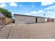 Single-story home with xeriscape landscaping and a concrete driveway, offering low-maintenance living at 1108 Putnam Ave, North Las Vegas, NV 89030