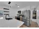 Bright kitchen features stainless steel appliances, quartz countertops, modern cabinets, and light wood flooring at 1108 Putnam Ave, North Las Vegas, NV 89030