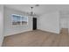 Bright living room featuring modern chandelier, and a view to the outside at 1108 Putnam Ave, North Las Vegas, NV 89030