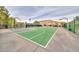 Well-maintained basketball court surrounded by landscaping, perfect for sports and outdoor activities at 11334 Patores St, Las Vegas, NV 89141