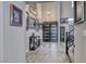 Elegant foyer with soaring ceilings, tile floors, and a stylish front door at 11334 Patores St, Las Vegas, NV 89141