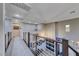 Open hallway provides a view of the living area and upstairs exercise equipment at 11334 Patores St, Las Vegas, NV 89141