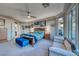 Comfortable main bedroom featuring lots of natural light, neutral walls and carpeted floors at 11334 Patores St, Las Vegas, NV 89141