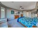 Spacious main bedroom featuring lots of natural light, neutral walls and carpeted floors at 11334 Patores St, Las Vegas, NV 89141