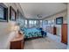 Comfortable main bedroom featuring lots of natural light, neutral walls and carpeted floors at 11334 Patores St, Las Vegas, NV 89141
