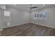 Spacious bedroom with hardwood floors and large windows providing ample natural light at 12 Golden View St, Henderson, NV 89012