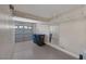 Garage with storage cabinets, overhead racks, and epoxy flooring at 12 Golden View St, Henderson, NV 89012