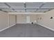A spacious garage with an epoxy floor and ample room for storage at 12 Golden View St, Henderson, NV 89012