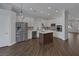 Bright kitchen with stainless appliances, large island, and lots of cabinet space at 12 Golden View St, Henderson, NV 89012