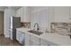 Kitchen featuring stainless steel appliances, sleek countertops, and ample natural light at 12 Golden View St, Henderson, NV 89012