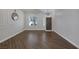 Spacious living room featuring hardwood floors, decorative trim, and contemporary lighting at 12 Golden View St, Henderson, NV 89012