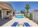 A private backyard pool with lush landscaping and an outdoor patio area at 12 Golden View St, Henderson, NV 89012