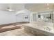 Large bathroom with a soaking tub and separate shower stall at 1393 Calmview Pl, Las Vegas, NV 89110