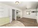 Bedroom with carpet and tile floors, neutral paint and sliding mirrored closet at 1393 Calmview Pl, Las Vegas, NV 89110