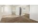 Spacious bedroom featuring built-in shelving, desk, and a mirrored closet, perfect for organization at 1393 Calmview Pl, Las Vegas, NV 89110