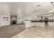 Open-concept, with fireplace, built-in shelving, and open to the kitchen at 1393 Calmview Pl, Las Vegas, NV 89110