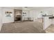Bright, open-concept living room with fireplace and easy access to the dining area at 1393 Calmview Pl, Las Vegas, NV 89110
