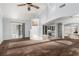 Open main bedroom concept featuring an ensuite bathroom, carpet floors, and sliding glass doors at 1393 Calmview Pl, Las Vegas, NV 89110