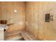 Inviting home sauna featuring wood walls, benches, and heater for a relaxing experience at 1393 Calmview Pl, Las Vegas, NV 89110