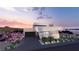 Contemporary home featuring unique architectural design and desert landscaping, creating a striking curb appeal at 1508 Pleasant Bay Ct, Henderson, NV 89011