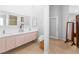 Elegant bathroom featuring double vanity and a separate dressing area at 179 Adomeit Dr, Henderson, NV 89074