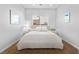 Cozy bedroom with soft carpet, a comfortable bed, and natural light from the window at 179 Adomeit Dr, Henderson, NV 89074