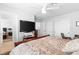 Bedroom with a ceiling fan, closet, and private bathroom offers a comfortable living space at 179 Adomeit Dr, Henderson, NV 89074