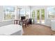 Bonus room provides ample natural light, workspace, and outdoor access through glass doors at 179 Adomeit Dr, Henderson, NV 89074