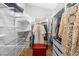 Organized walk-in closet with shelving and hanging racks at 179 Adomeit Dr, Henderson, NV 89074